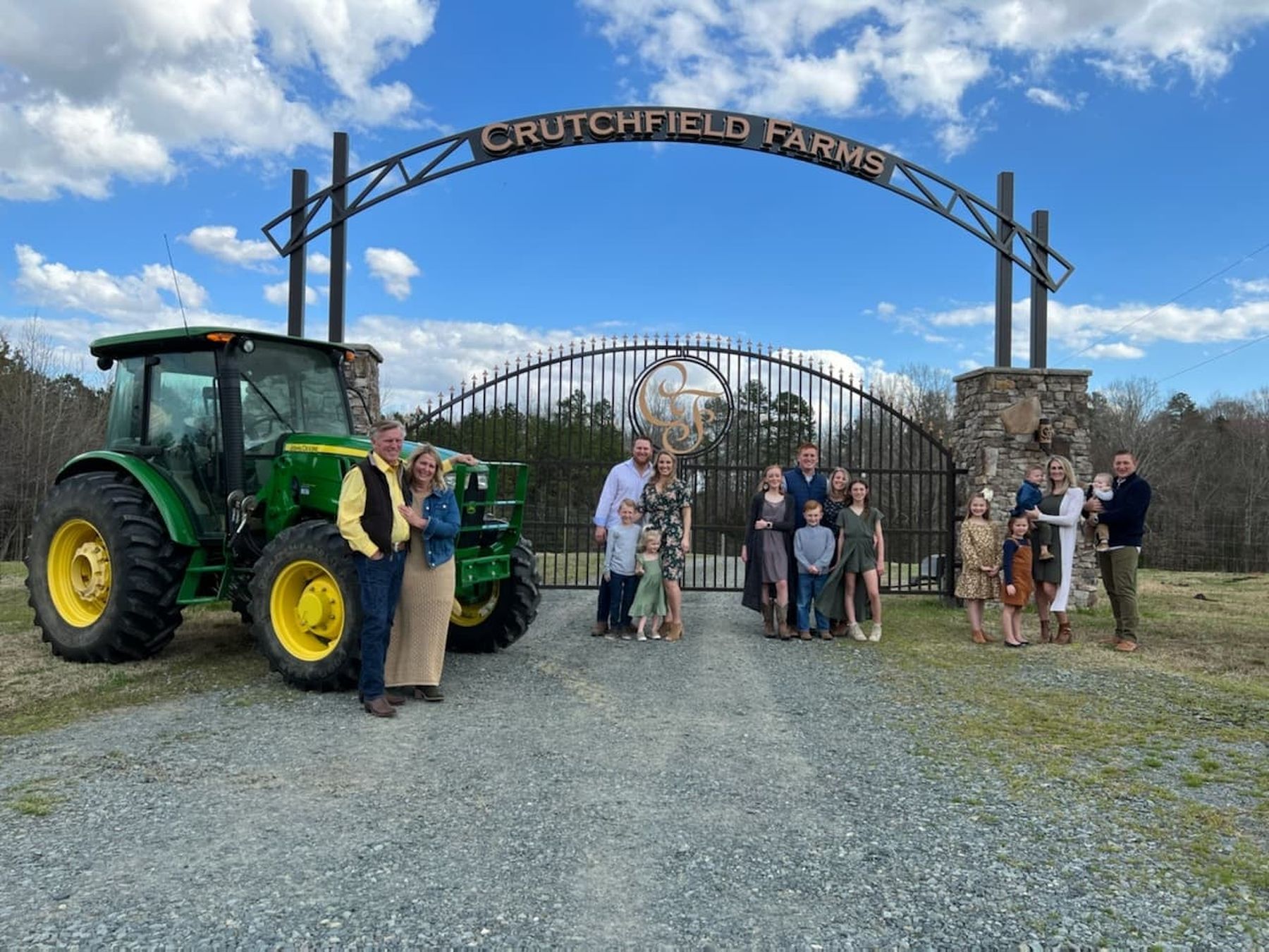 The Crutchfield family at the farm gate